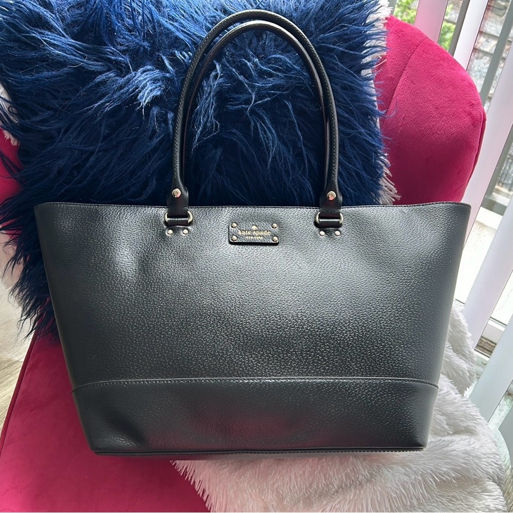 NEW with TAGS! Never carried. In original dust bag.